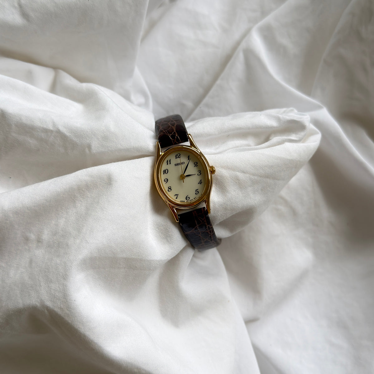 90s Seiko Oval Gold Leather Watch