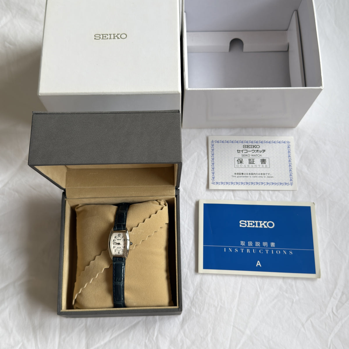 00s Seiko Exceline Silver Tonneau Leather Watch